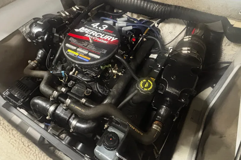 Slide: The Image of Engine of 2004 Sea Ray 185 Bow Rider with 4.3L Mercury MerCruiser. - 29