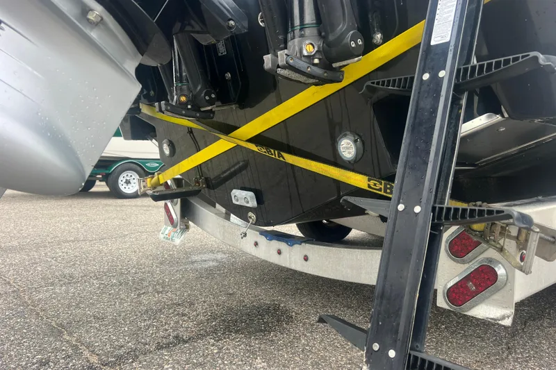 Slide: The Image of 2022 Sea-Lion 34 TE boat secured on trailer with yellow straps. - 12