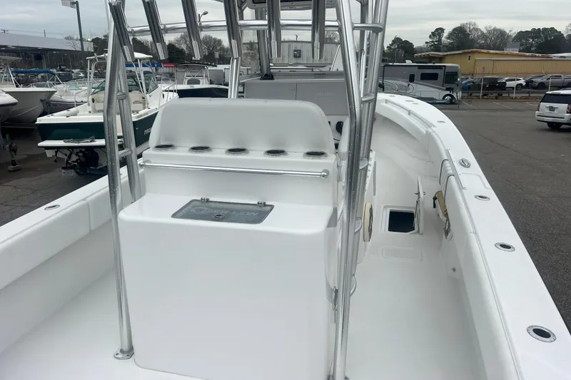 Slide: The Image of 2022 Sea-Lion 34 TE boat interior with center console and rod holders. - 14