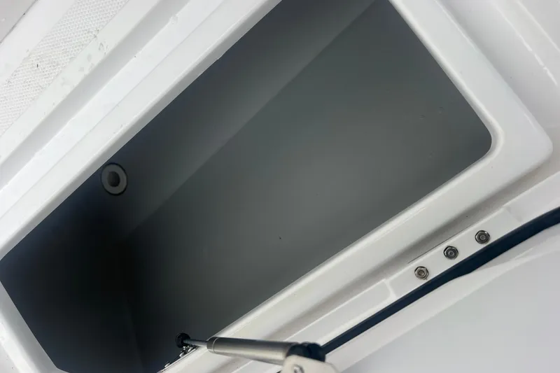 Slide: The Image of Open storage compartment on 2022 Sea-Lion 34 TE boat. - 25