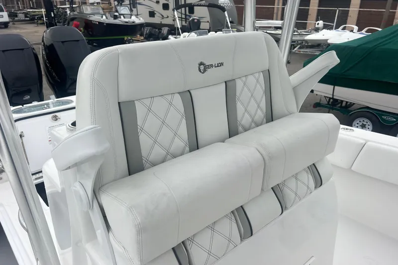 Slide: The Image of Luxurious seating on 2022 Sea-Lion 34 TE boat, featuring elegant white upholstery. - 26