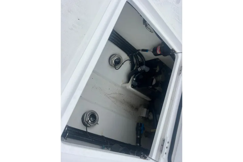 Slide: The Image of Open compartment of 2022 Sea-Lion 34 TE boat showing internal components and wiring. - 36