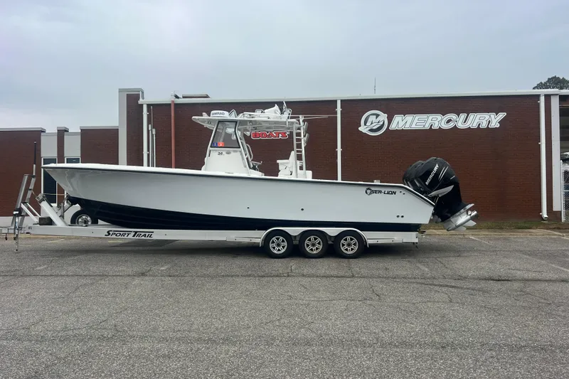 Slide: The Image of 2022 Sea-Lion 34 TE boat on trailer, parked outside Mercury building. - 39