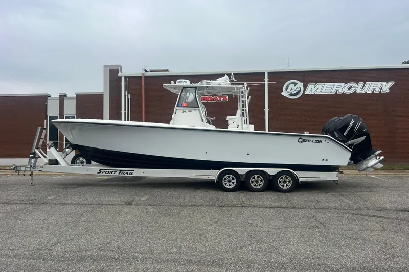 Slide: The Image of 2022 Sea-Lion 34 TE boat on trailer, parked outside Mercury building. - 40