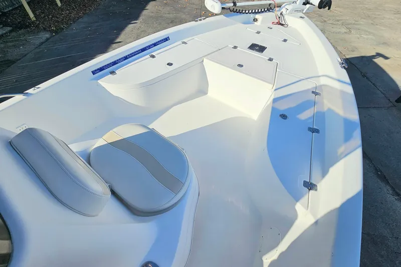 Slide: The Image of 2007 NauticStar 2110 Nautic Bay boat interior with seating and storage compartments. - 6