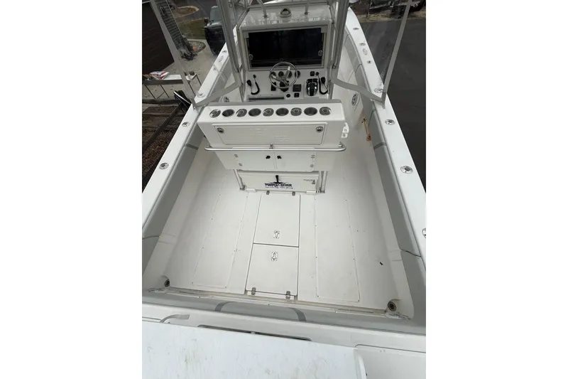 Slide: The Image of 2006 SeaVee 340B boat cockpit with helm station and storage compartments. - 31