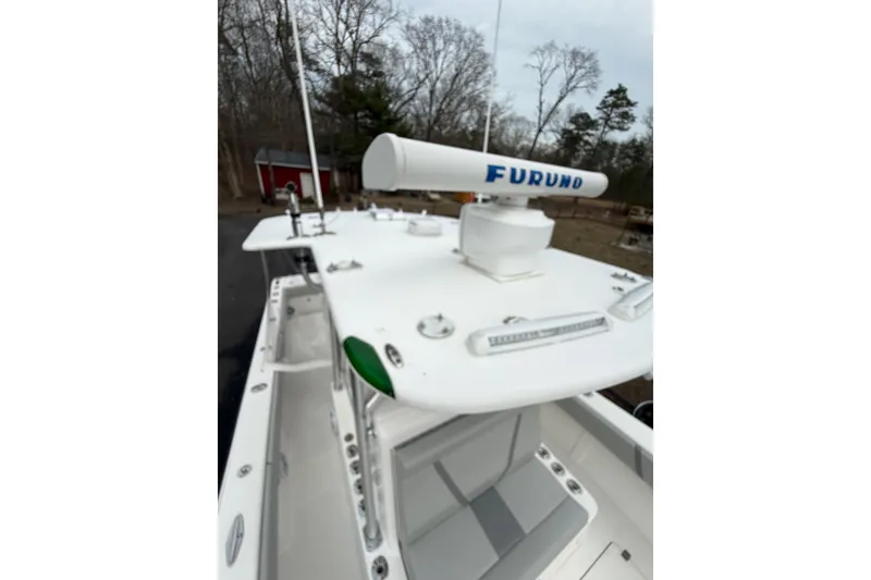 Slide: The Image of 2006 SeaVee 340B boat with Furuno radar, docked outdoors. - 71