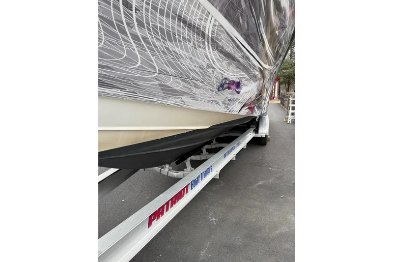 Slide: The Image of 2006 SeaVee 340B boat on trailer, showcasing detailed hull design. - 82