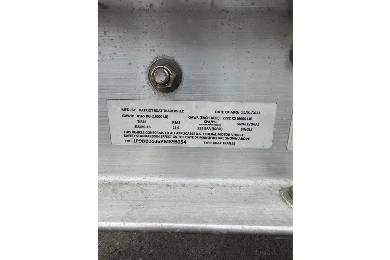 Slide: The Image of Label on Patriot Boat Trailer, detailing specifications and VIN for SeaVee 340B, 2006 model. - 84