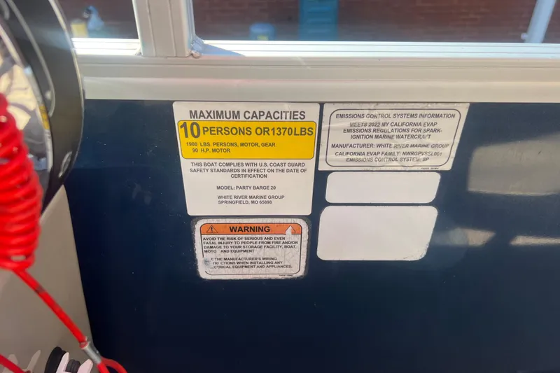 Slide: The Image of 2023 Sun Tracker Party Barge 20 DLX capacity label, 10 persons or 1370 lbs. - 17