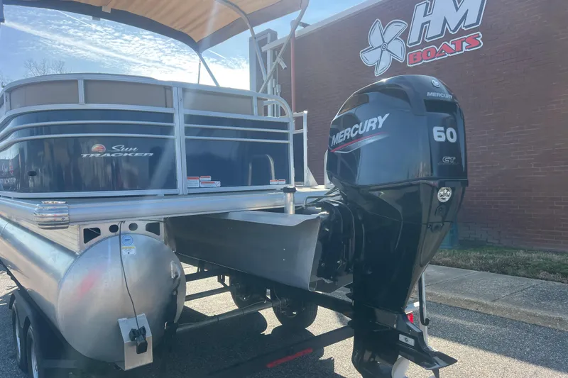 Slide: The Image of 2023 Sun Tracker Party Barge 20 DLX with Mercury 60 engine at HM Boats dealership. - 4