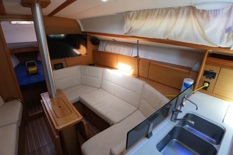 Slide: The Image of Interior of 2009 Jeanneau Sun Odyssey 36i yacht with cozy seating and modern amenities. - 20