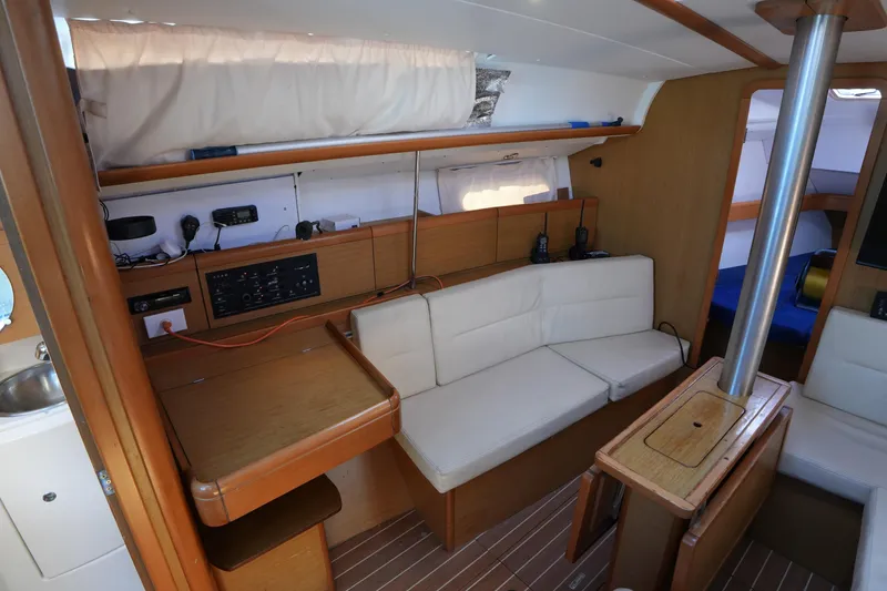 Slide: The Image of Interior of 2009 Jeanneau Sun Odyssey 36i sailboat with seating and navigation equipment. - 21