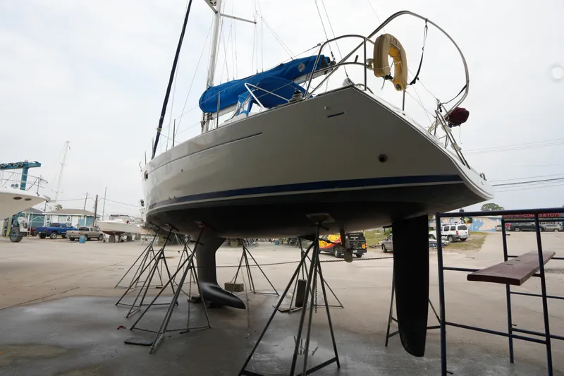 Slide: The Image of 2009 Jeanneau Sun Odyssey 36i sailboat on stands in a boatyard. - 6