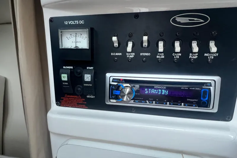 Slide: The Image of Control panel of a 2001 Chaparral Signature 260 boat with Kenwood stereo system. - 18