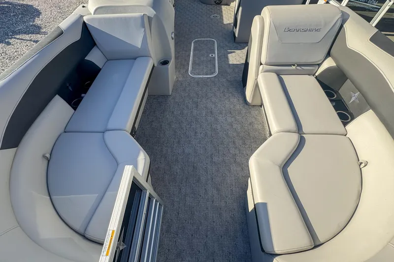 Slide: The Image of 2025 Berkshire 22CL LE boat interior with spacious seating and modern design. - 5