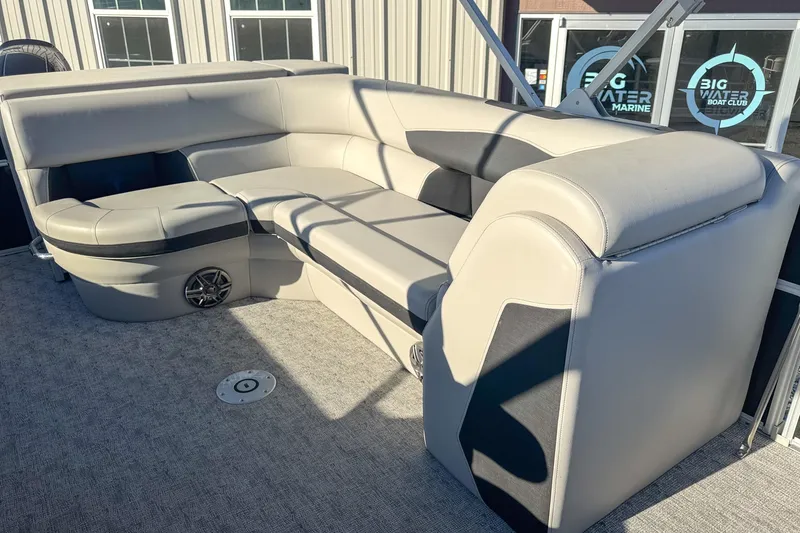 Slide: The Image of 2025 Berkshire 22CL LE pontoon boat interior with plush seating and modern design. - 6