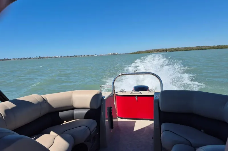 Slide: The Image of Pontoon boat cruising on open water, Avalon 2785, 2017 model, sunny day. - 22