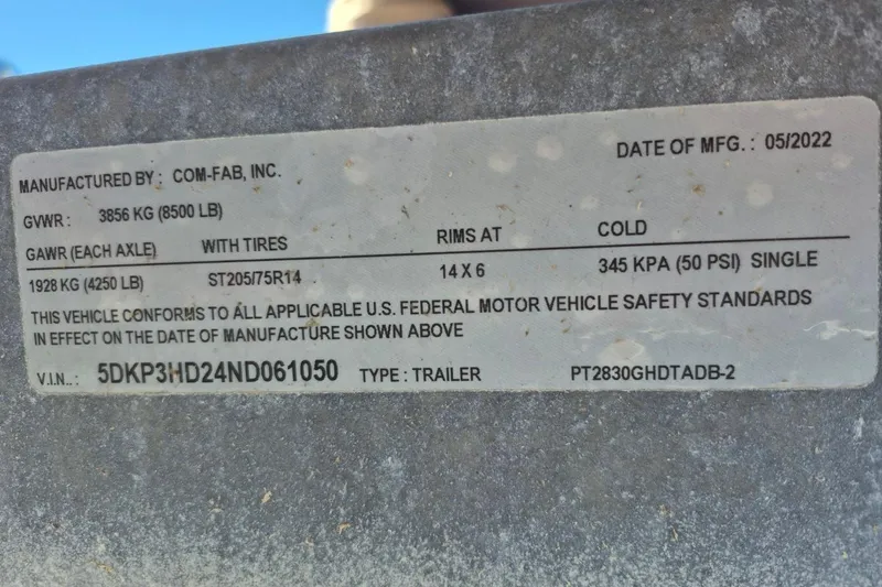 Slide: The Image of Label on a 2017 Avalon 2785 trailer, manufactured by Com-Fab, Inc., May 2022. - 24