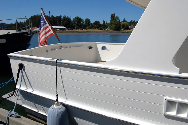 Slide: The Image of 1981 Ocean Alexander 50 Pilothouse yacht docked. - 12