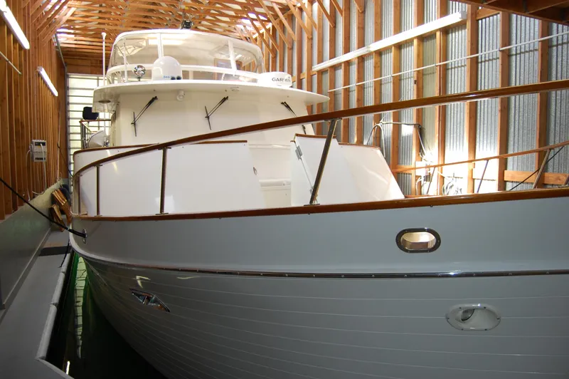 Slide: The Image of 1981 Ocean Alexander 50 Pilothouse yacht in a boathouse. - 21