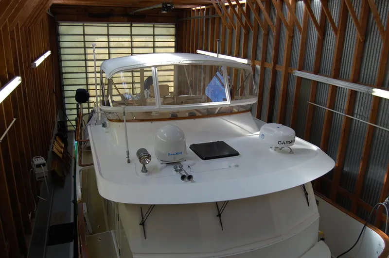 Slide: The Image of 1981 Ocean Alexander 50 Pilothouse in a boathouse. - 24