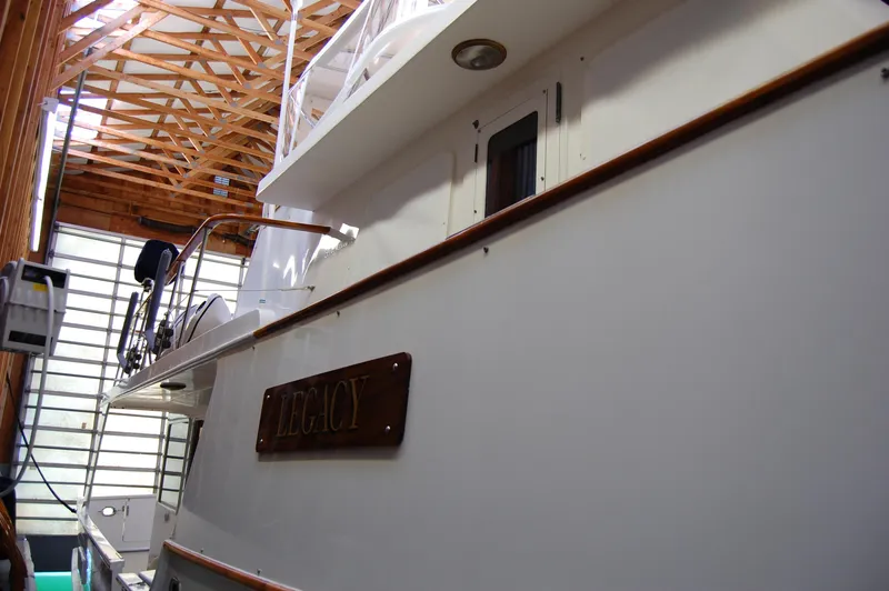 Slide: The Image of 1981 Ocean Alexander 50 Pilothouse yacht in a boathouse. - 27