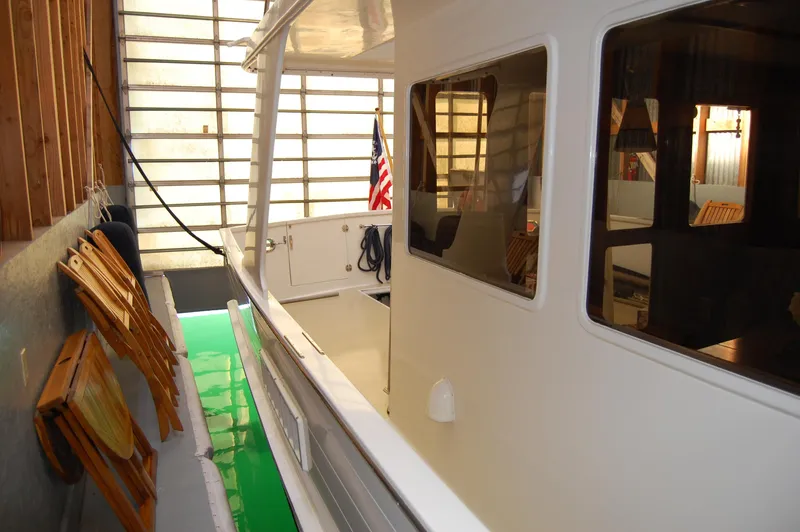 Slide: The Image of Ocean Alexander 50 Pilothouse 1981 in a boathouse. - 28