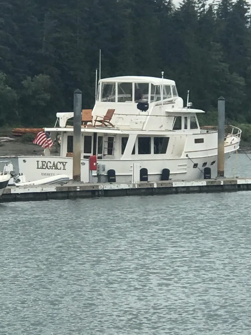 Slide: The Image of 1981 Ocean Alexander 50 Pilothouse yacht docked. - 4