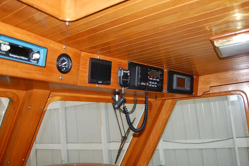 Slide: The Image of Interior of 1981 Ocean Alexander 50 Pilothouse with wood paneling. - 41