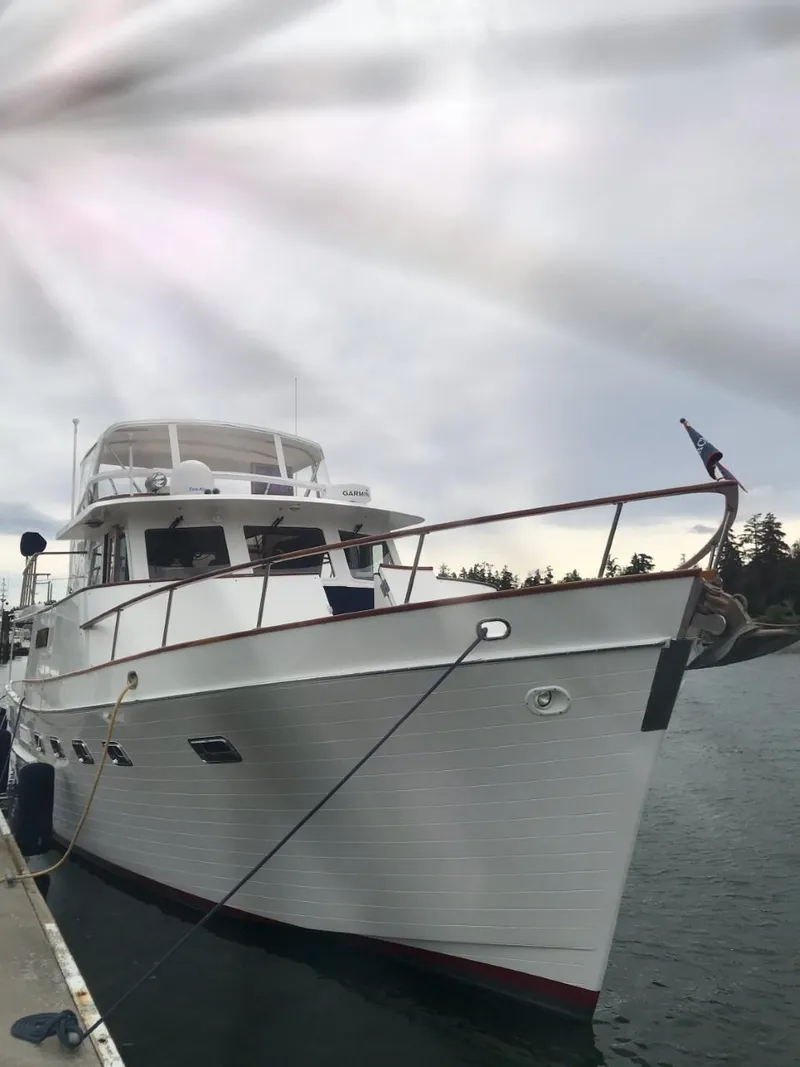Slide: The Image of 1981 Ocean Alexander 50 Pilothouse yacht docked. - 5