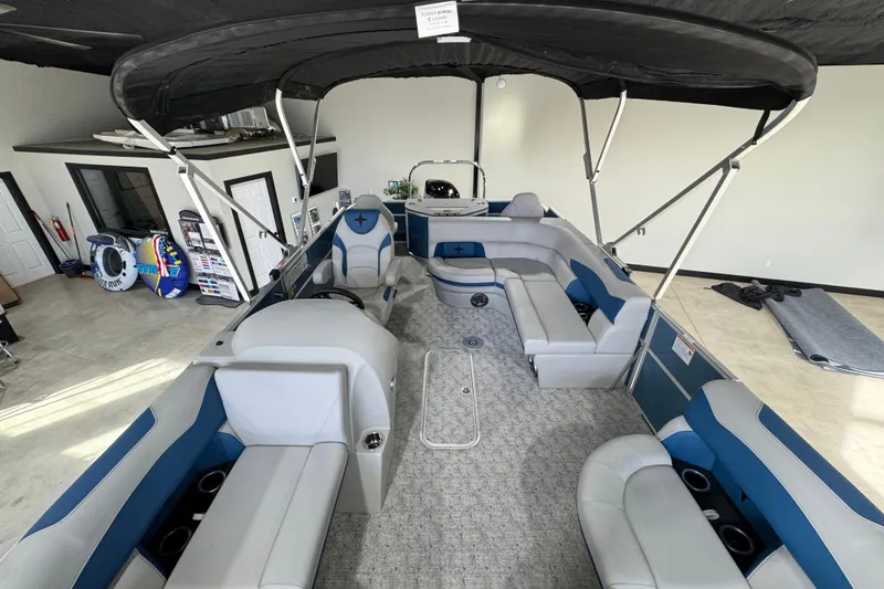 Slide: The Image of 2025 Berkshire 22RFC LE pontoon boat interior with spacious seating and canopy. - 12