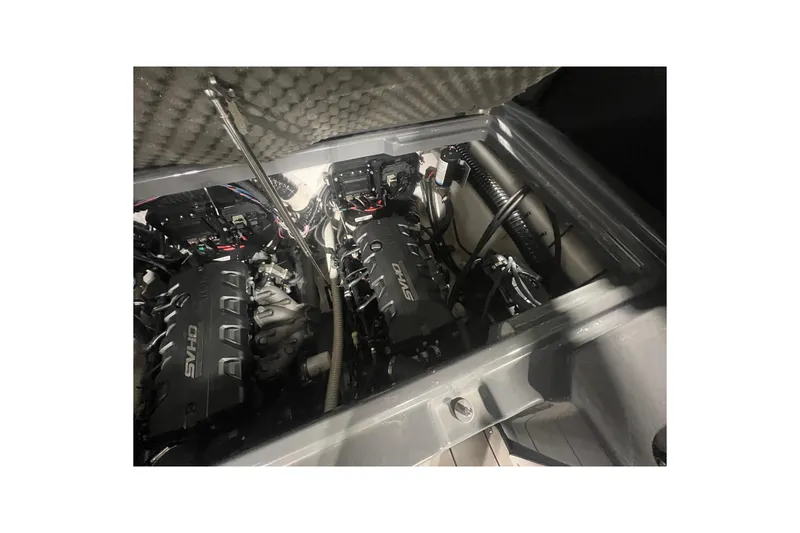 Slide: The Image of 2021 Yamaha Boats 255XD engine compartment with dual SVHO engines. - 13