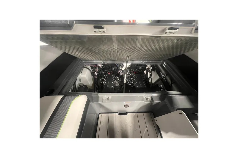 Slide: The Image of Engine compartment of 2021 Yamaha Boats 255XD, showcasing dual engines and interior details. - 14