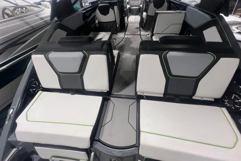 Slide: The Image of 2021 Yamaha Boats 255XD interior with modern seating and sleek design. - 15