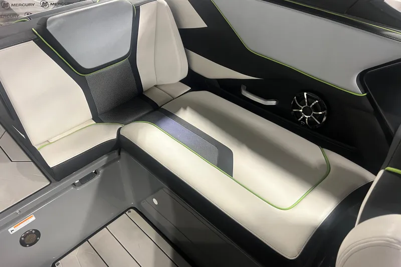 Slide: The Image of Interior seating of 2021 Yamaha Boats 255XD with modern design and speaker detail. - 19