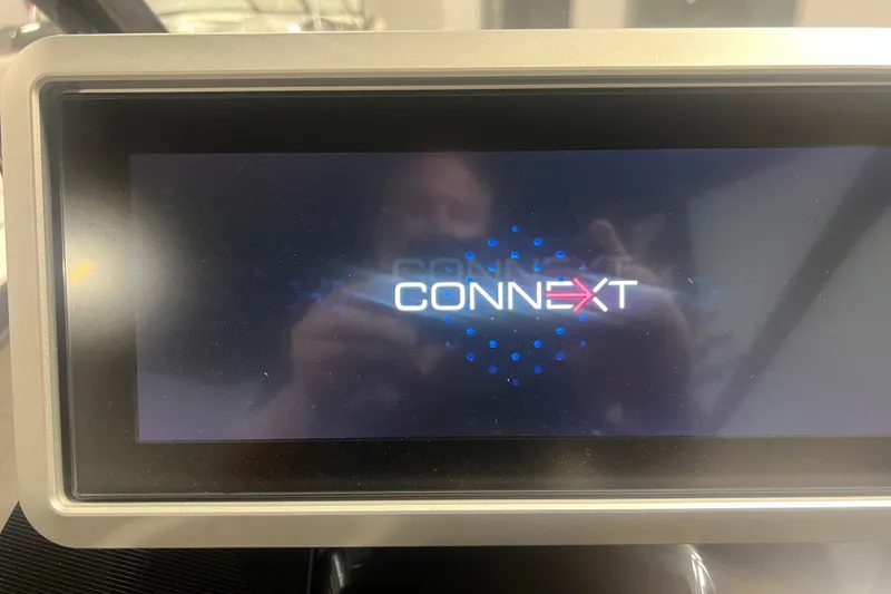 Slide: The Image of Display screen showing "Connext" interface on 2021 Yamaha Boats 255XD. - 22