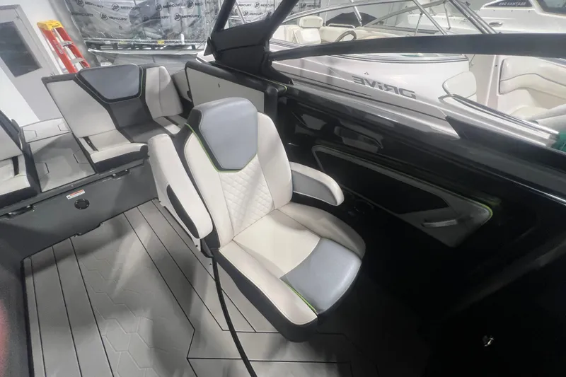 Slide: The Image of Interior of 2021 Yamaha Boats 255XD, featuring modern seating and sleek design elements. - 27