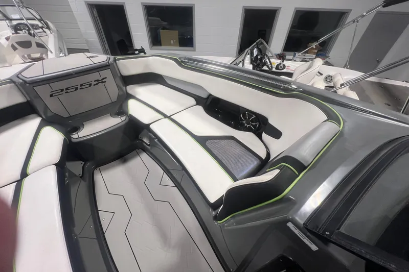 Slide: The Image of Interior of 2021 Yamaha Boats 255XD, featuring sleek seating and modern design elements. - 29