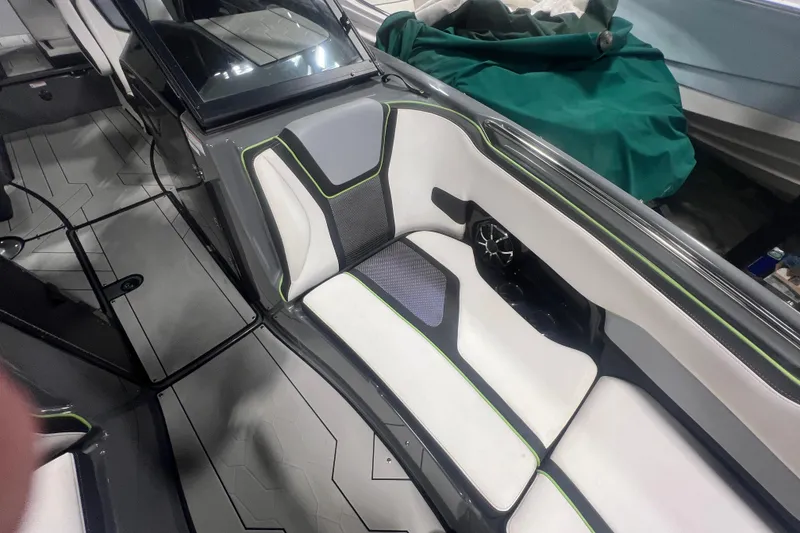 Slide: The Image of Interior of 2021 Yamaha Boats 255XD, featuring sleek seating and modern design elements. - 32