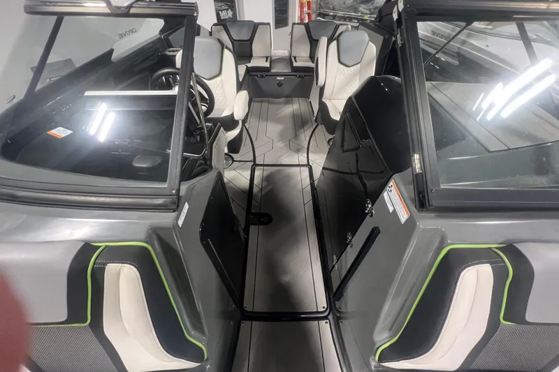 Slide: The Image of Interior view of 2021 Yamaha Boats 255XD, showcasing sleek seating and modern design. - 34
