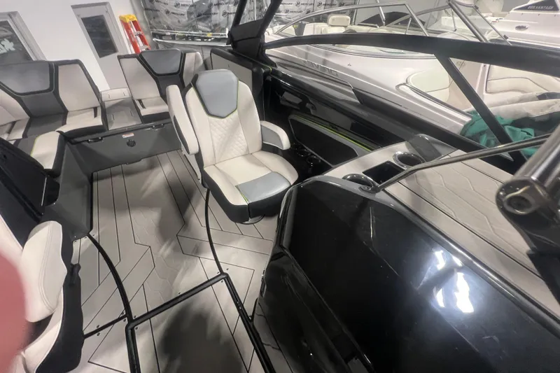 Slide: The Image of Interior of a 2021 Yamaha Boats 255XD, featuring modern seating and sleek design. - 35