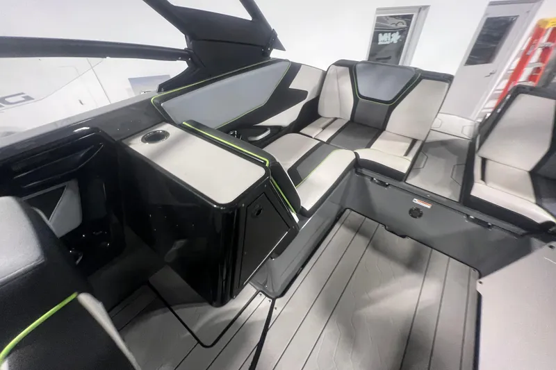 Slide: The Image of Interior of 2021 Yamaha Boats 255XD, featuring sleek seating and modern design elements. - 37