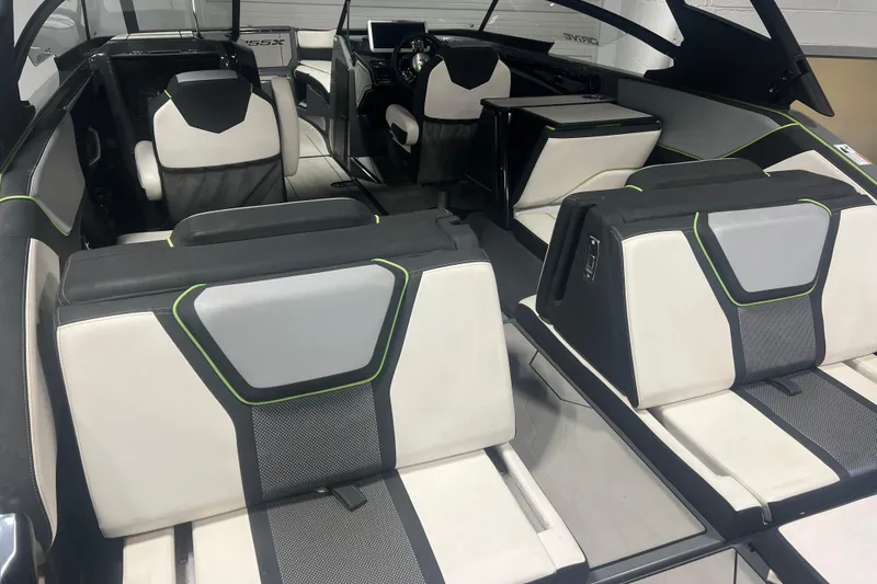 Slide: The Image of Interior of 2021 Yamaha Boats 255XD, featuring modern seating and sleek design. - 9
