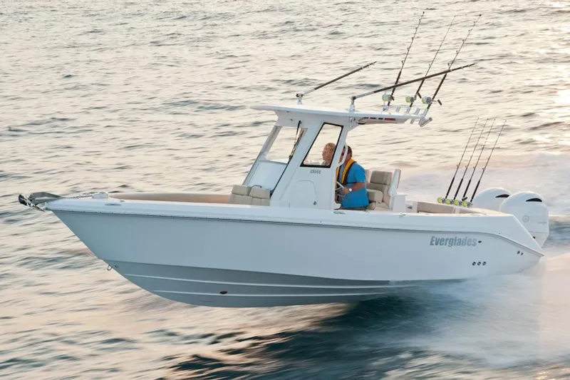 The Image of Manufacturer Provided Image: 2015 Everglades 255 Center Console boat cruising on water with fishing rods. - 0