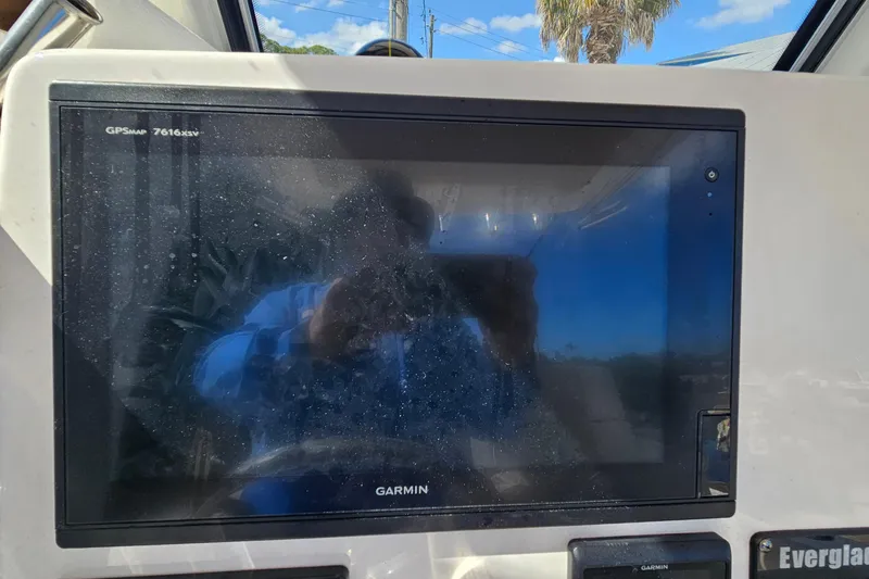 Slide: The Image of Garmin GPS display on 2015 Everglades 255 Center Console boat dashboard. - 15