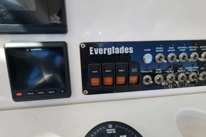 Slide: The Image of Control panel of a 2015 Everglades 255 Center Console boat with Garmin display. - 17