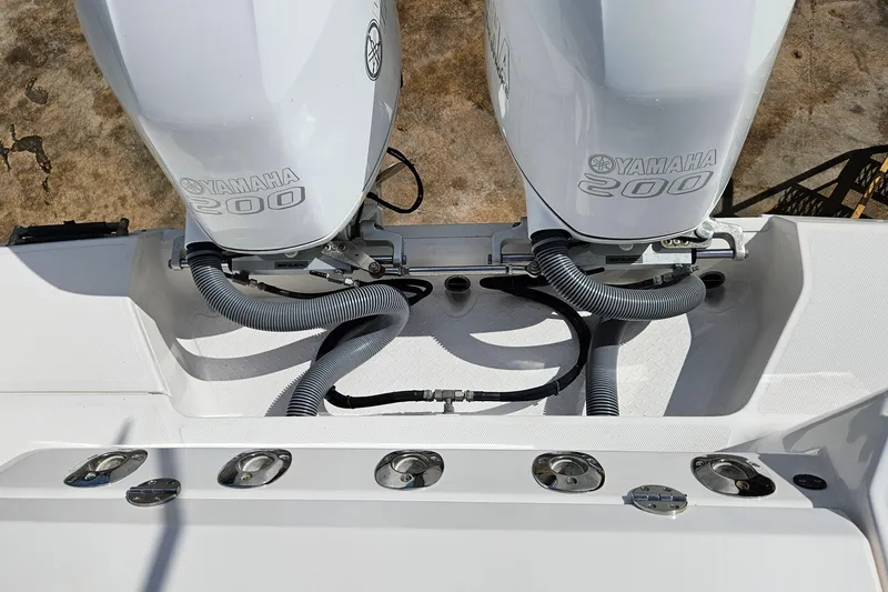 Slide: The Image of Twin Yamaha 200 engines on a 2015 Everglades 255 Center Console boat. - 37