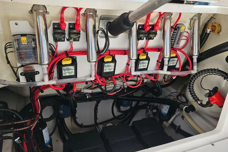 Slide: The Image of Electrical wiring and components inside a 2015 Everglades 255 Center Console boat. - 38