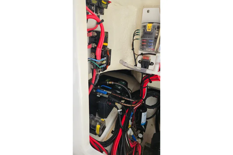 Slide: The Image of Electrical wiring and components inside a 2015 Everglades 255 Center Console boat. - 40